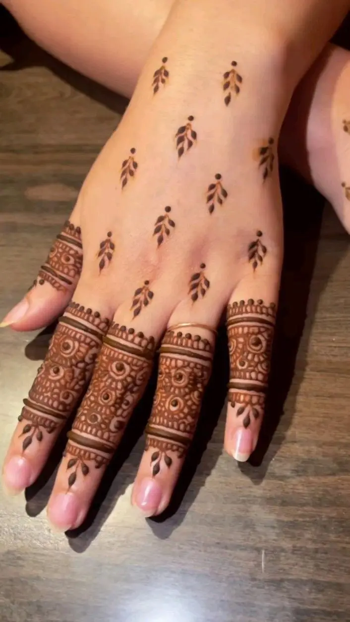 modern back hand mehndi design