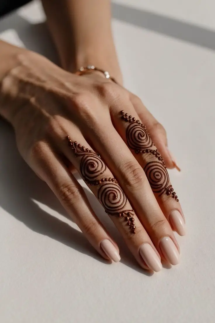 cross back hand mehndi design