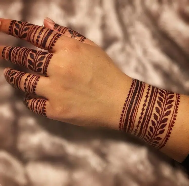 cross back hand mehndi design