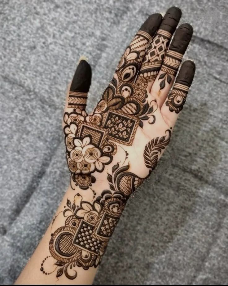 simple cross mehndi design front hand
